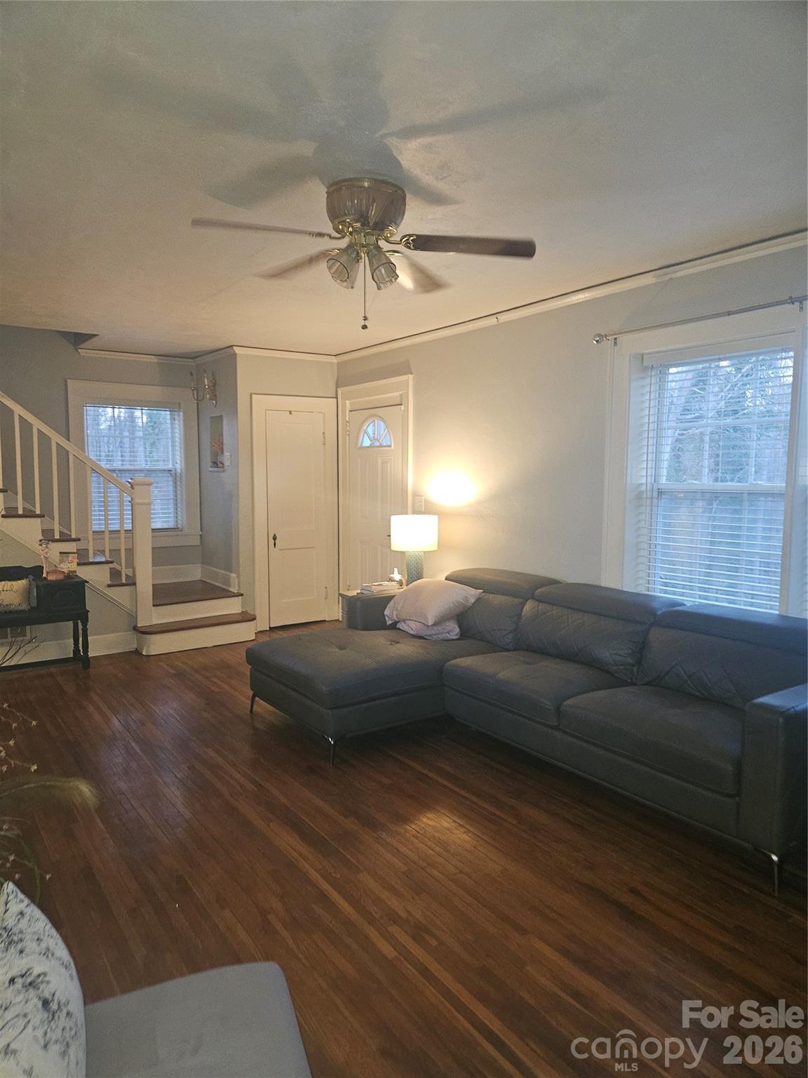 313 Mountain Creek Road Albemarle, NC 28001 - Photo 8 of 23 a living room with furniture and a wooden floor