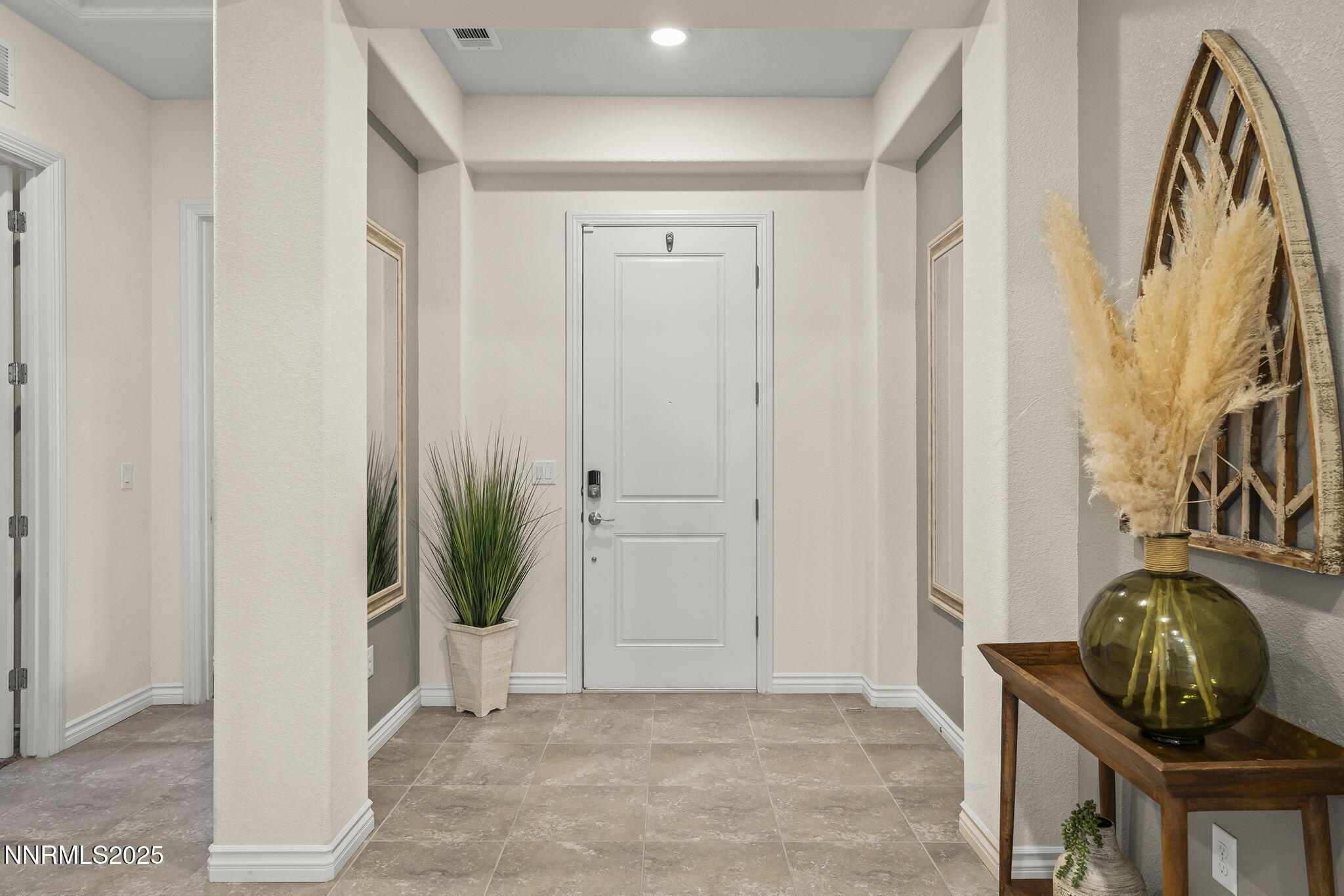 425 Chelmsford Drive Reno, NV 89439 - Photo 27 of 36 a view of a entryway door with wooden floor