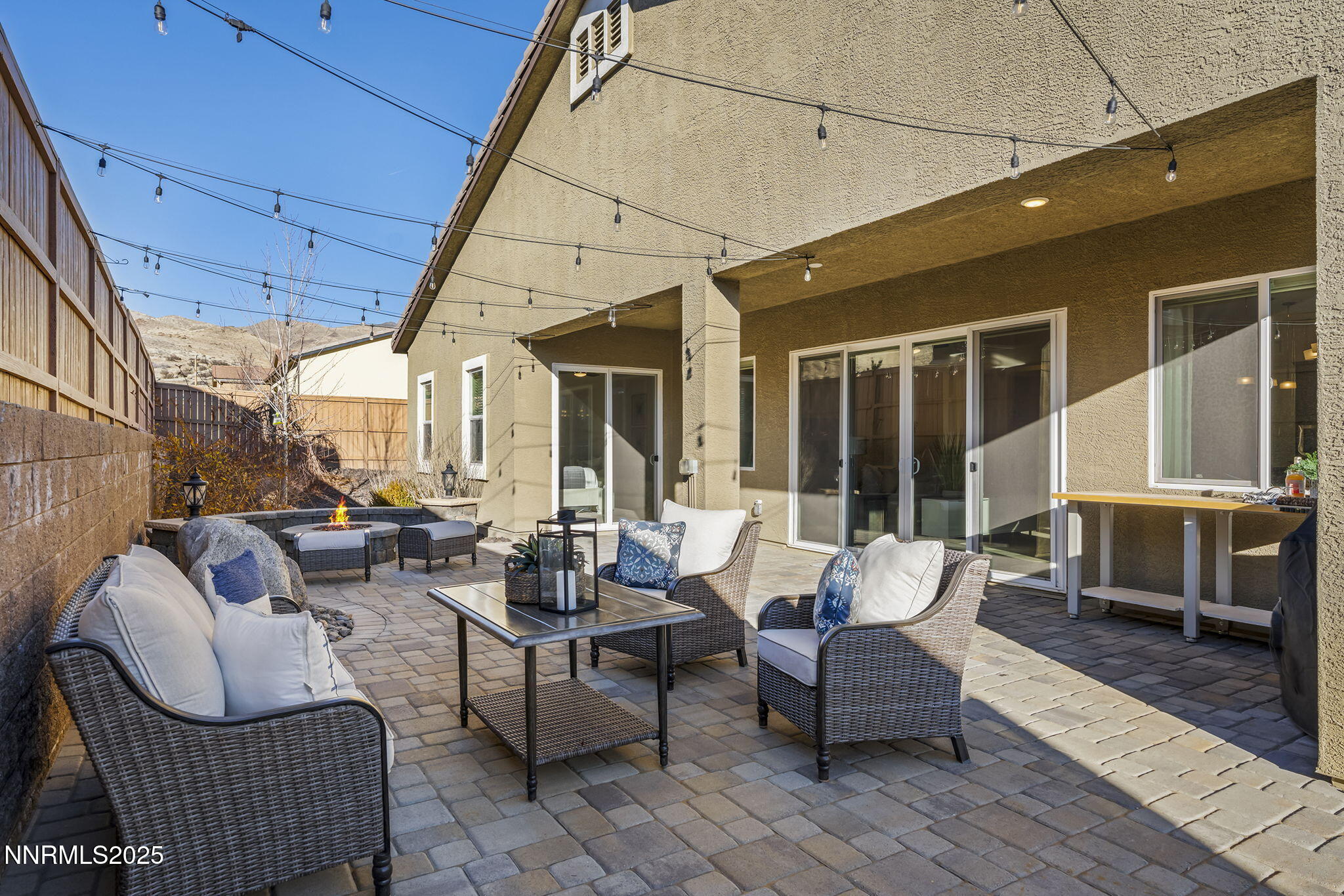 425 Chelmsford Drive Reno, NV 89439 - Photo 36 of 36 a building outdoor space with patio furniture and potted plants