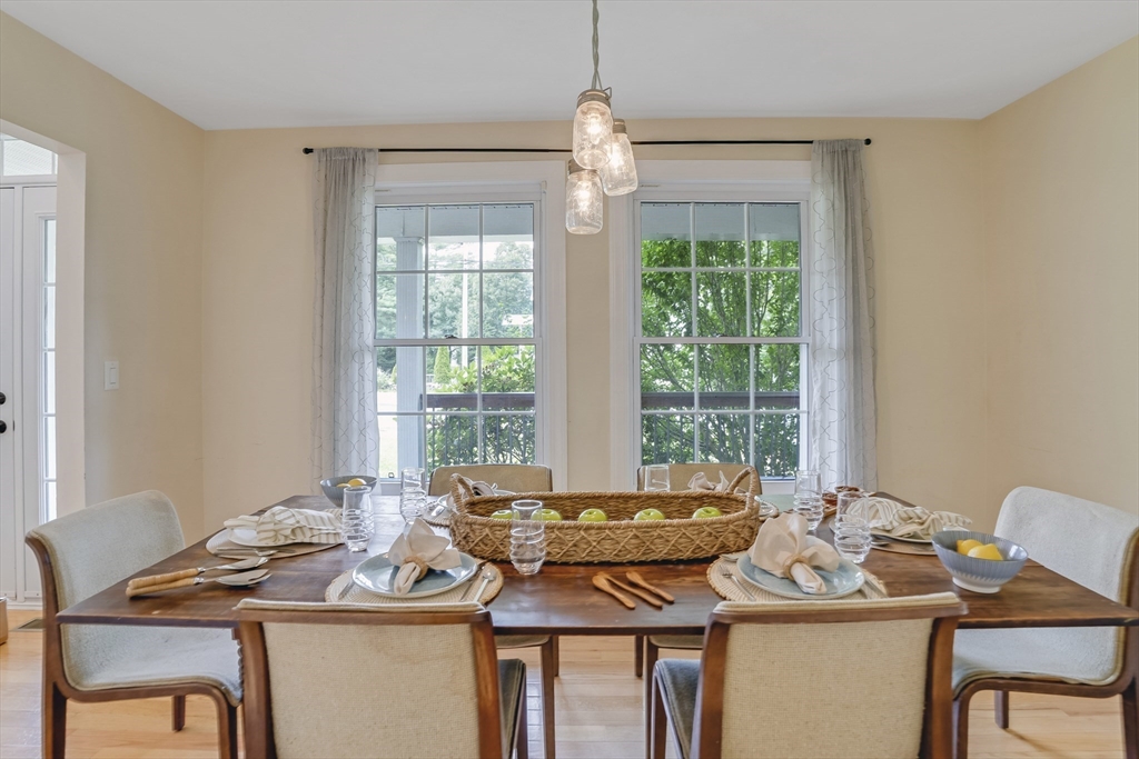 128-136 Spring Street Tisbury, MA 02568 - Photo 17 of 42 a view of a dining room with furniture window and outside view