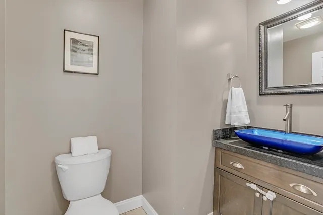 a bathroom with a toilet and sink