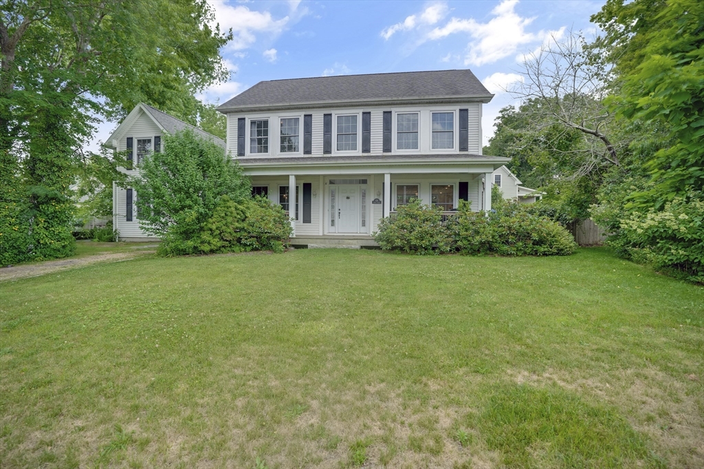 128-136 Spring Street Tisbury, MA 02568 - Photo 2 of 42 a front view of a house with a yard