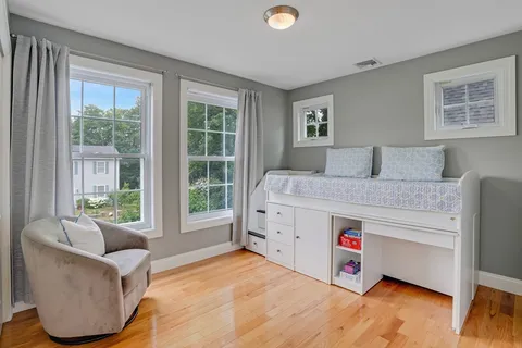 a bed room with a bed and a couch