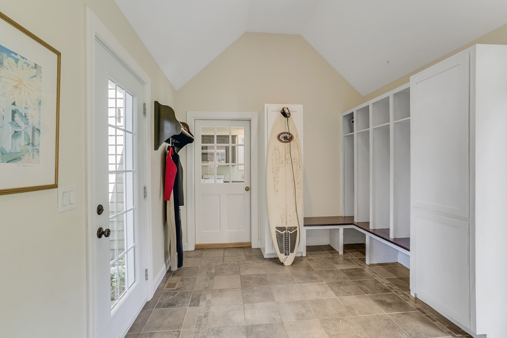 128-136 Spring Street Tisbury, MA 02568 - Photo 29 of 42 a view of a livingroom with a staircase