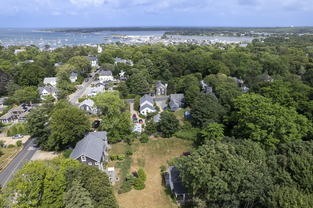 128-136 Spring Street Tisbury, MA 02568 - Photo 40 of 42 an aerial view of a city and mountain view in back