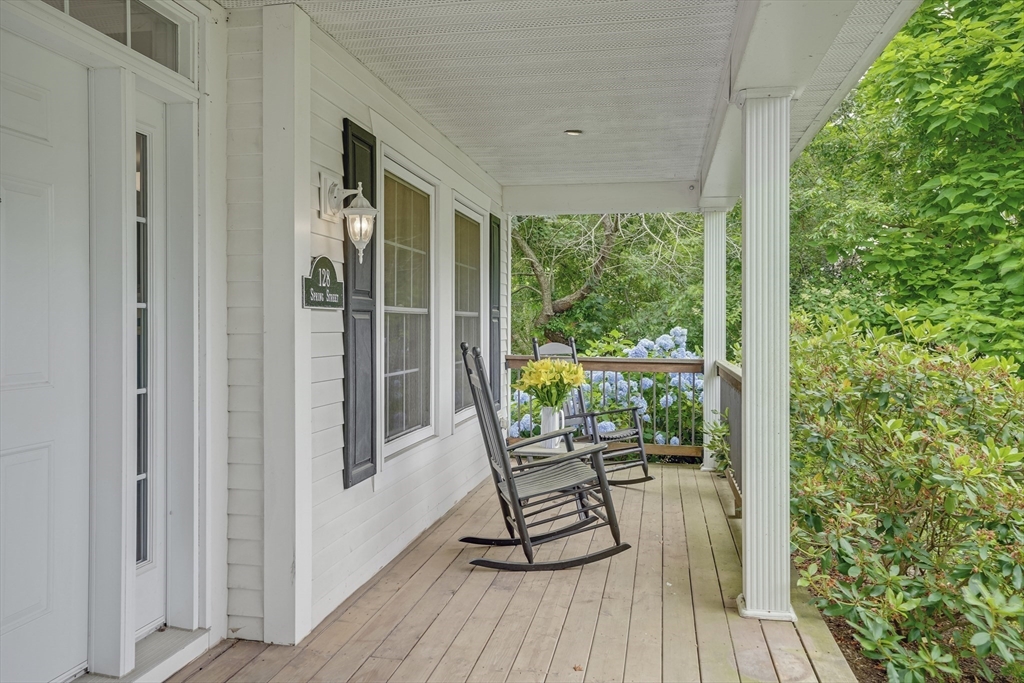 128-136 Spring Street Tisbury, MA 02568 - Photo 4 of 42 a view of a chairs in a balcony