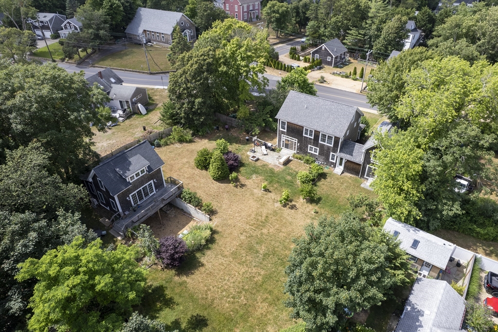 128-136 Spring Street Tisbury, MA 02568 - Photo 42 of 42 an aerial view of house with yard swimming pool and outdoor seating