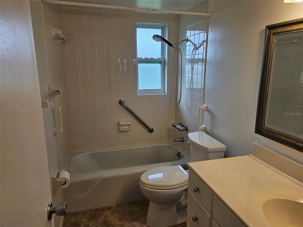 3304 Mcdill Road Bradenton, FL 34207 - Photo 13 of 23 a bathroom with a toilet a sink and bathtub
