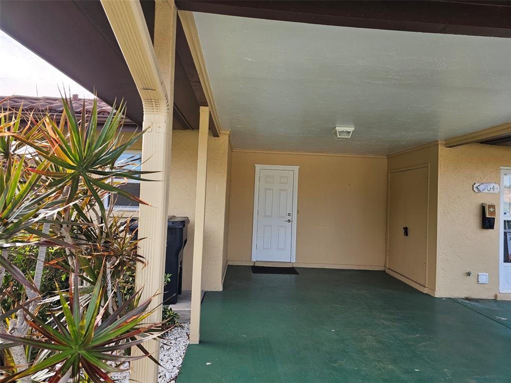 3304 Mcdill Road Bradenton, FL 34207 - Photo 2 of 23 a view of an entryway with plants