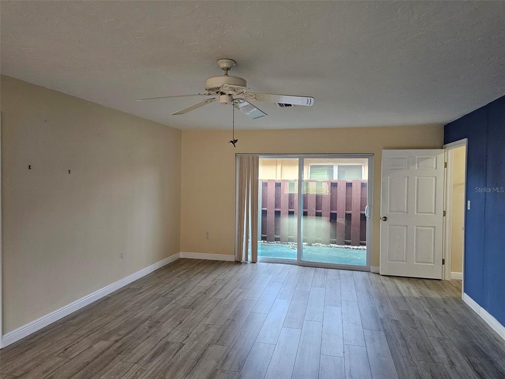 3304 Mcdill Road Bradenton, FL 34207 - Photo 3 of 23 a view of livingroom with hardwood floor and window