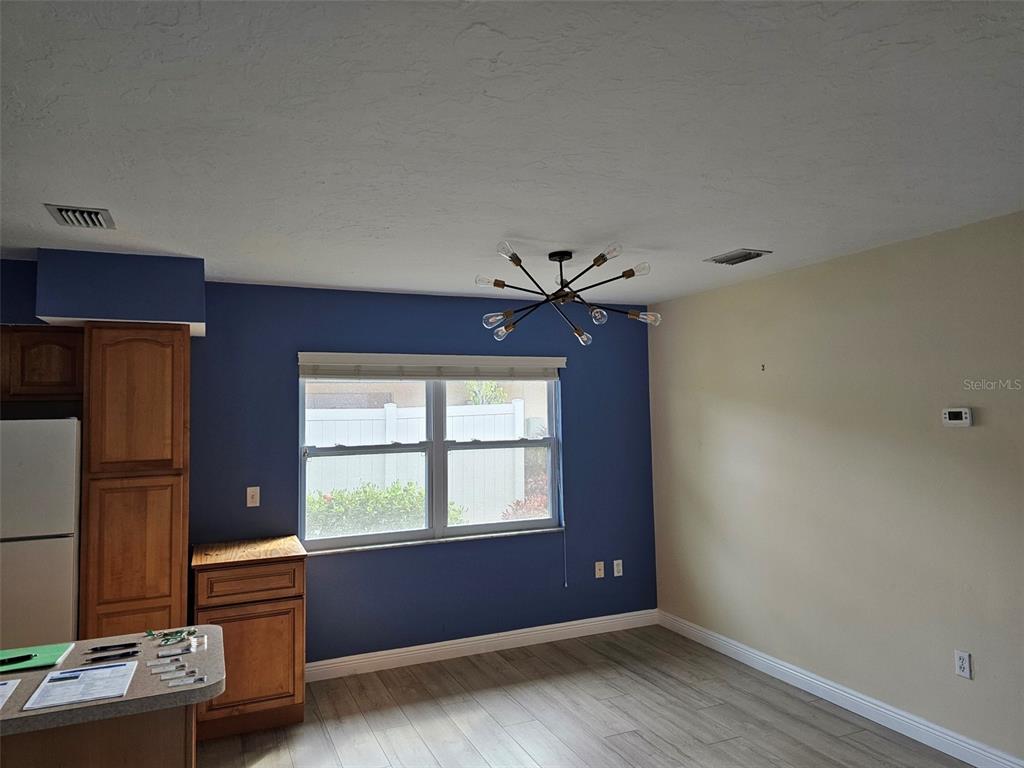 3304 Mcdill Road Bradenton, FL 34207 - Photo 5 of 23 an empty room with windows and closet