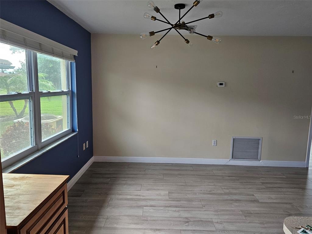 3304 Mcdill Road Bradenton, FL 34207 - Photo 8 of 23 a view of an empty room and window
