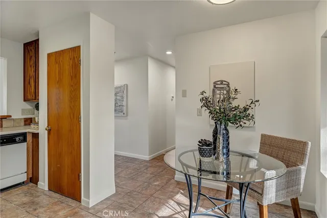 a view of a livingroom with furniture and a table