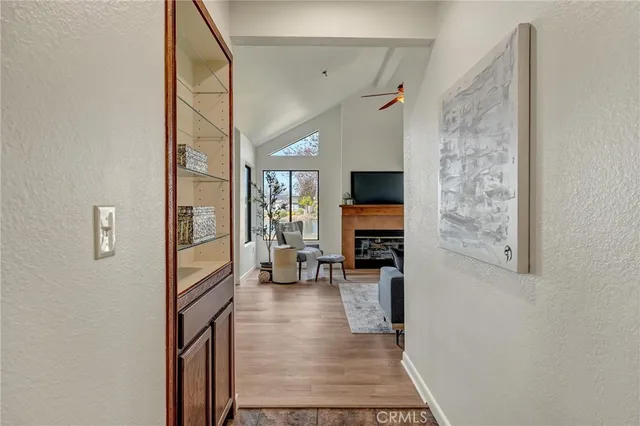 a view of living room with furniture and flat screen tv