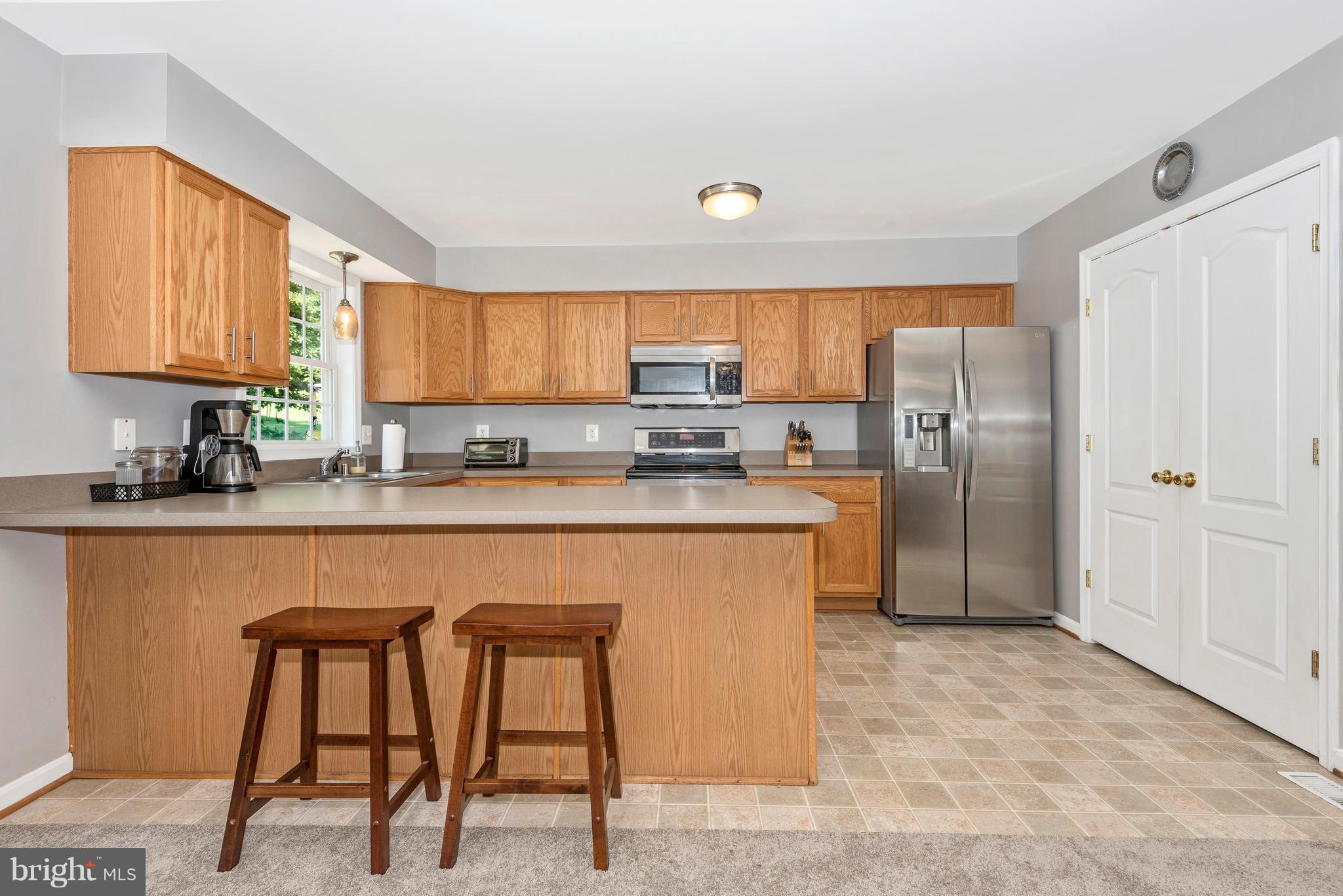 6439 Fulmer Road Frederick, MD 21703 - Photo 8 of 30 Kitchen has Breakfast Bar