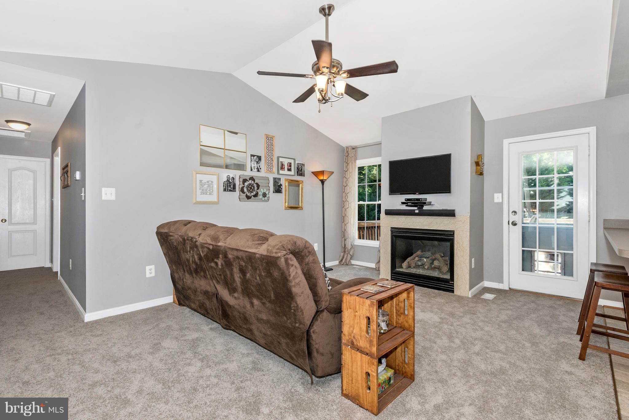 6439 Fulmer Road Frederick, MD 21703 - Photo 10 of 30 Living Room has Fireplace & Cathedral Ceilings