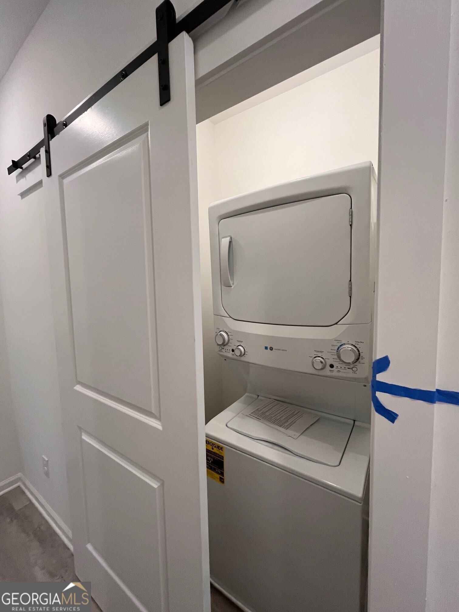 195 Jackson Heights, Unit 6 Cleveland, GA 30528 - Photo 8 of 17 Laundry room upstairs. Includes stackable washer and dryer.