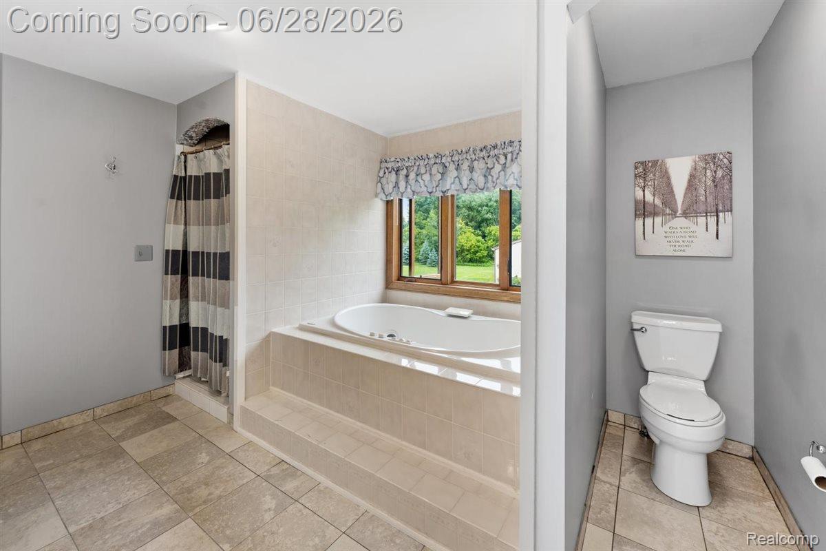 125 Olde Franklin Road Howell, MI 48855 - Photo 37 of 57 Large tiled walk-in shower
