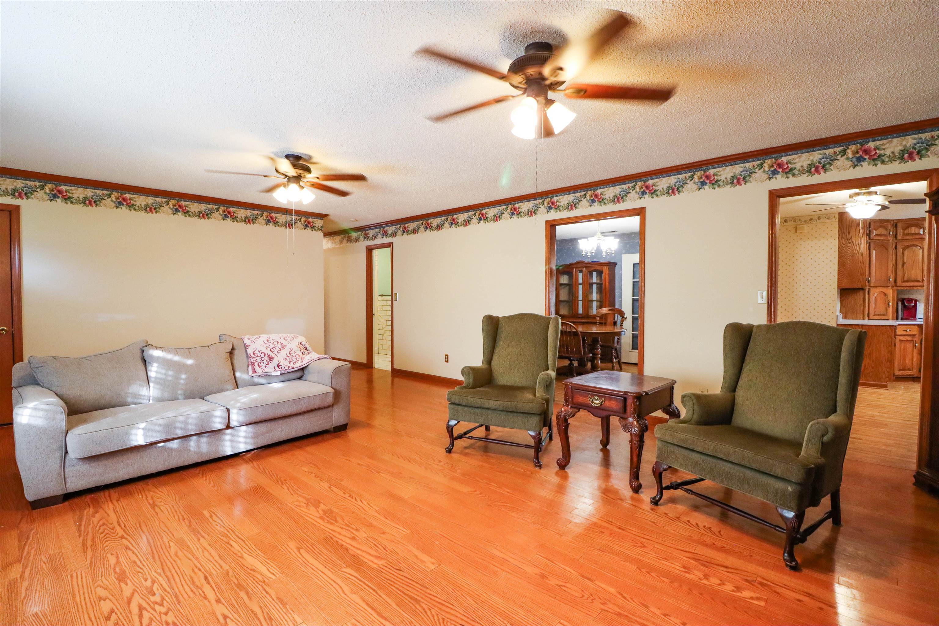 5551 Asbury Glimp Road Ripley, TN 38063 - Photo 16 of 28 a living room with furniture and a large window