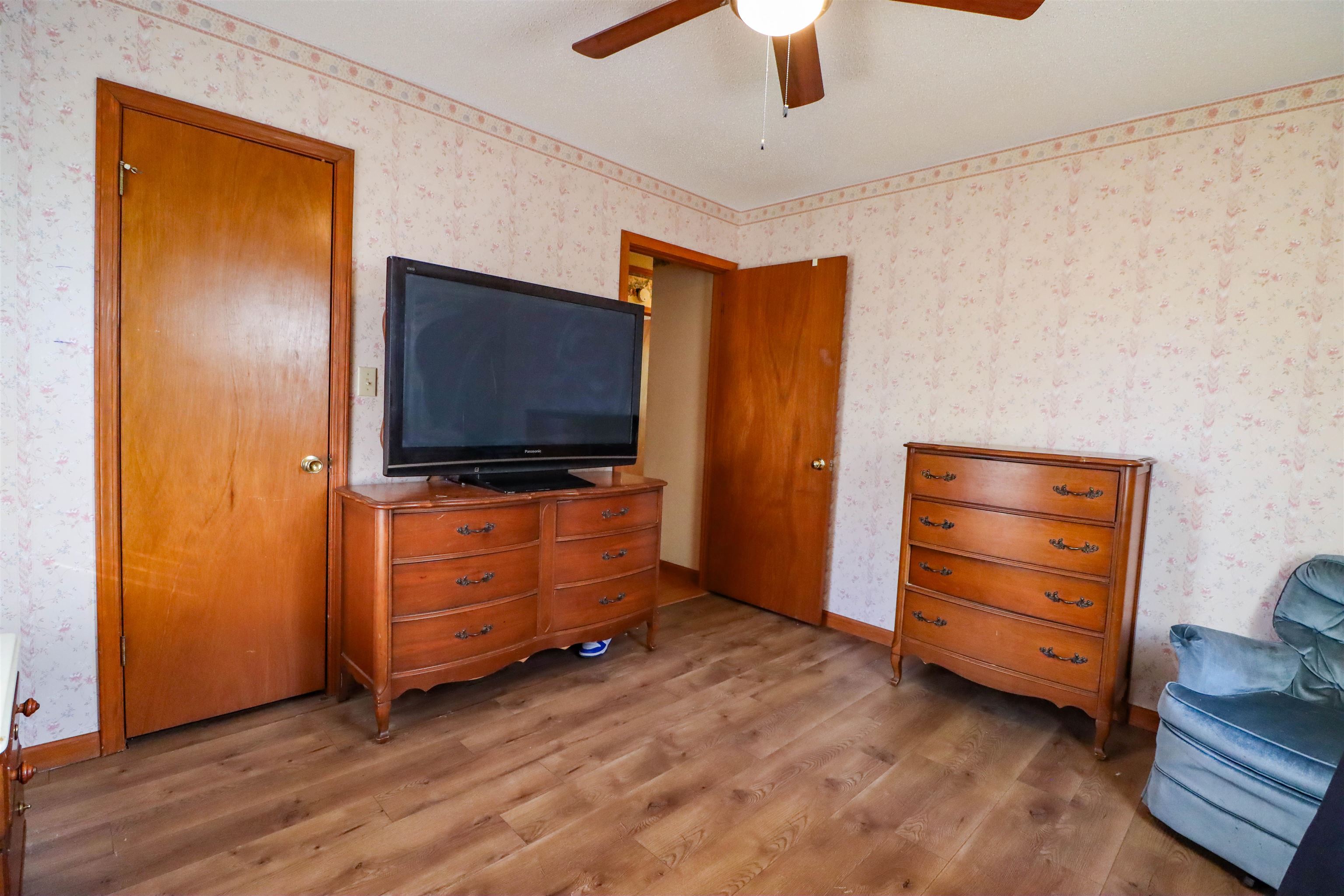 5551 Asbury Glimp Road Ripley, TN 38063 - Photo 19 of 28 a room with furniture and flat screen tv