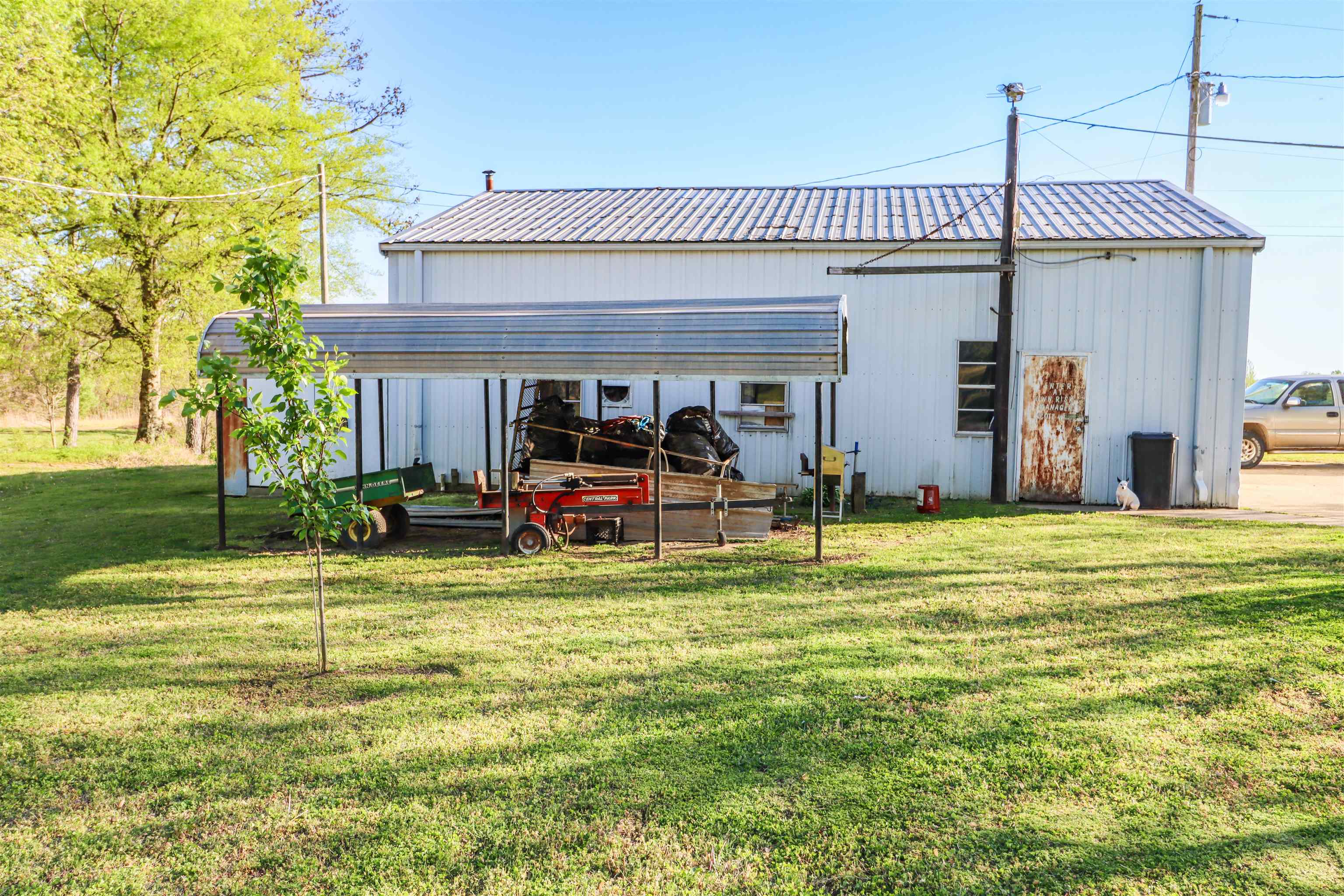 5551 Asbury Glimp Road Ripley, TN 38063 - Photo 28 of 28 a view of a house with a swimming pool