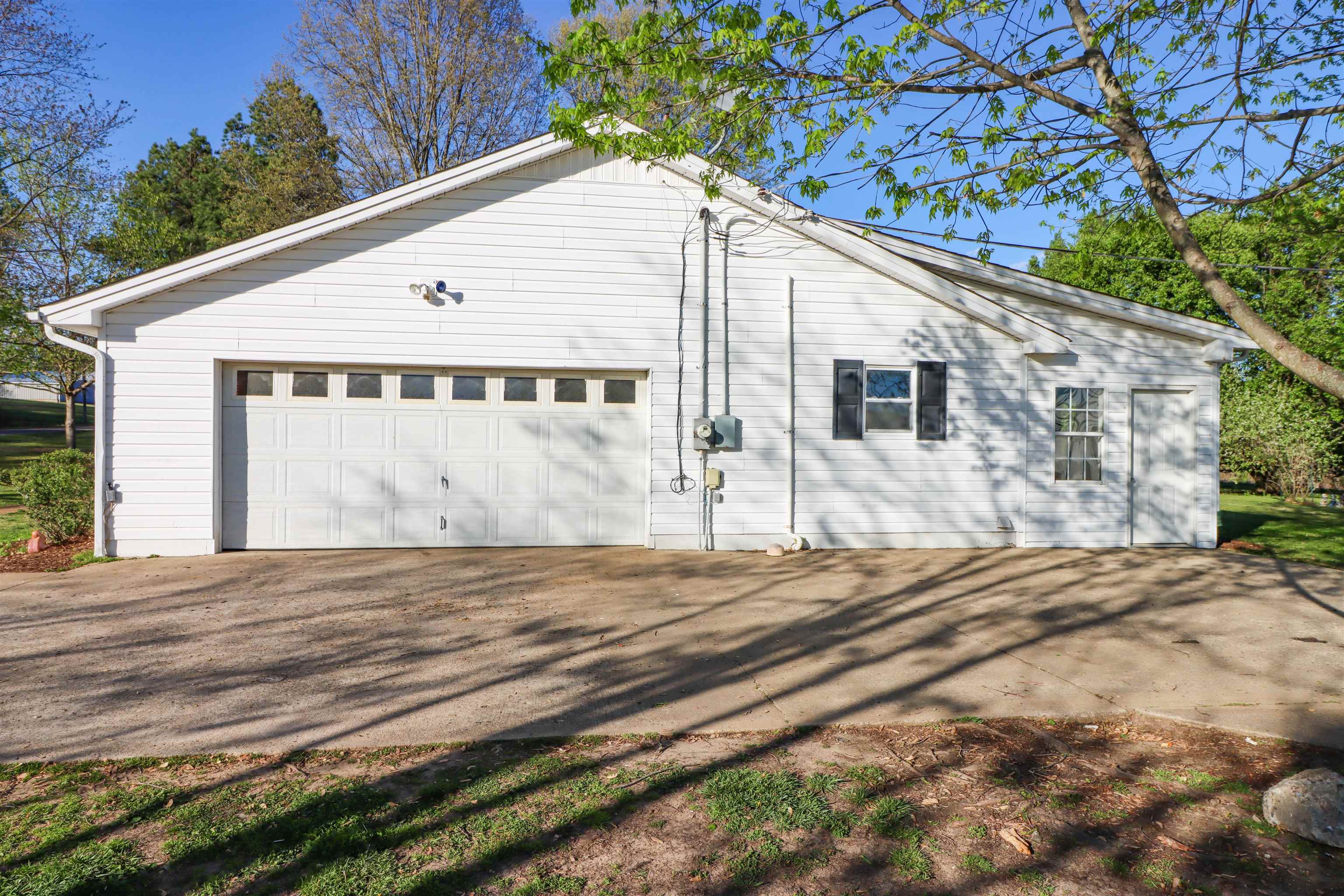 5551 Asbury Glimp Road Ripley, TN 38063 - Photo 3 of 28 a view of a house with a backyard