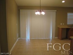 2817 13th Street Southwest Lehigh Acres, FL 33976 - Photo 7 of 9 a view of a livingroom with furniture