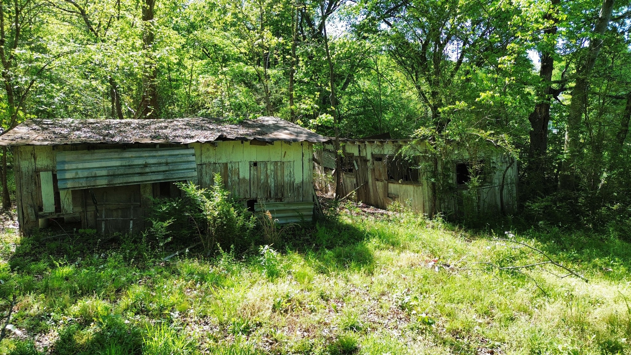 3321 Petway Road Ashland City, TN 37015 - Photo 21 of 23 a backyard of a house with lots of green space and fountain