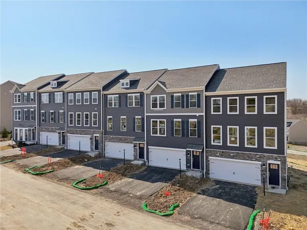 a front view of a building with street view