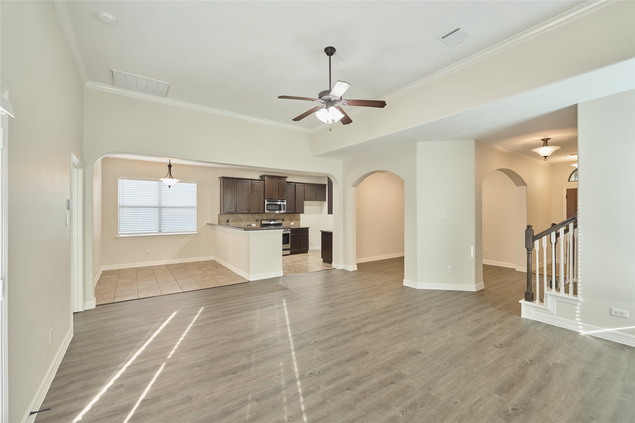 630 Aulia Lane Spring, TX 77386 - Photo 48 of 48 Open Floorplan Living Room view into Kitchen and Breakfast Dining