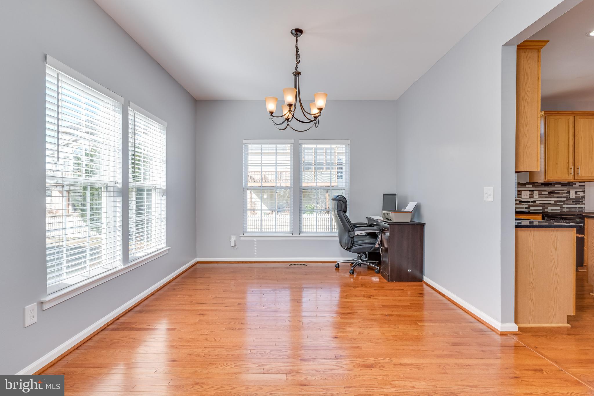 1331 Destrier Street Ranson, WV 25438 - Photo 11 of 53 Open to dining w/ hardwood and decorative fixture