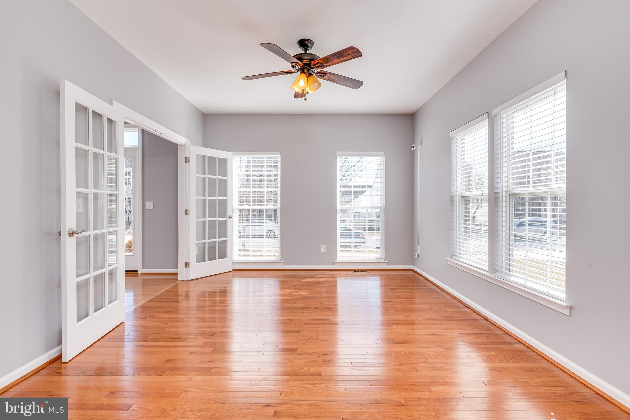 1331 Destrier Street Ranson, WV 25438 - Photo 8 of 53 Formal living room features tons of natural light