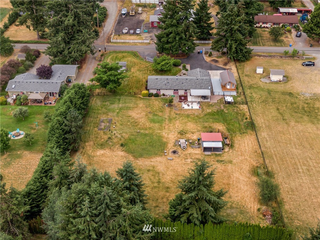 19206 Loganberry Street Southwest Rochester, WA 98579 - Photo 33 of 39 an aerial view of a houses with yard