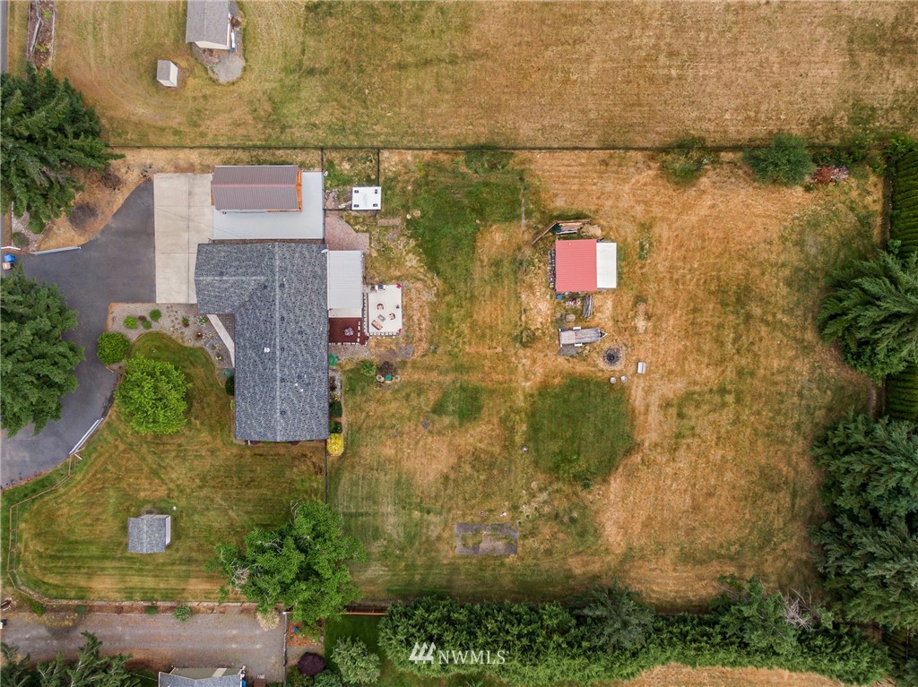 19206 Loganberry Street Southwest Rochester, WA 98579 - Photo 34 of 39 an aerial view of residential house with outdoor space