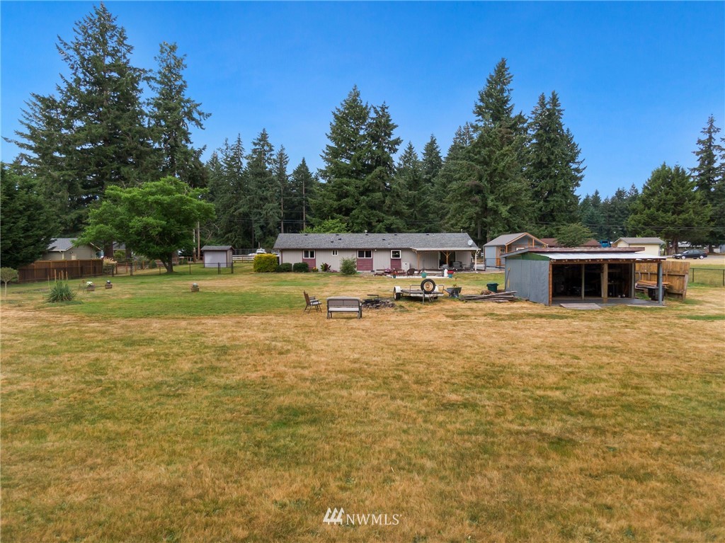 19206 Loganberry Street Southwest Rochester, WA 98579 - Photo 35 of 39 a swimming pool view with a lake view