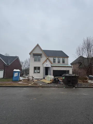 a front view of a house with street