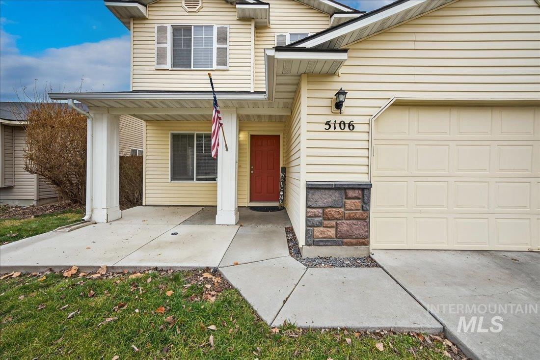 5106 Lathrop Place, Unit 19517 Caldwell, ID 83607 - Photo 4 of 29 View of exterior entry featuring covered porch and a garage