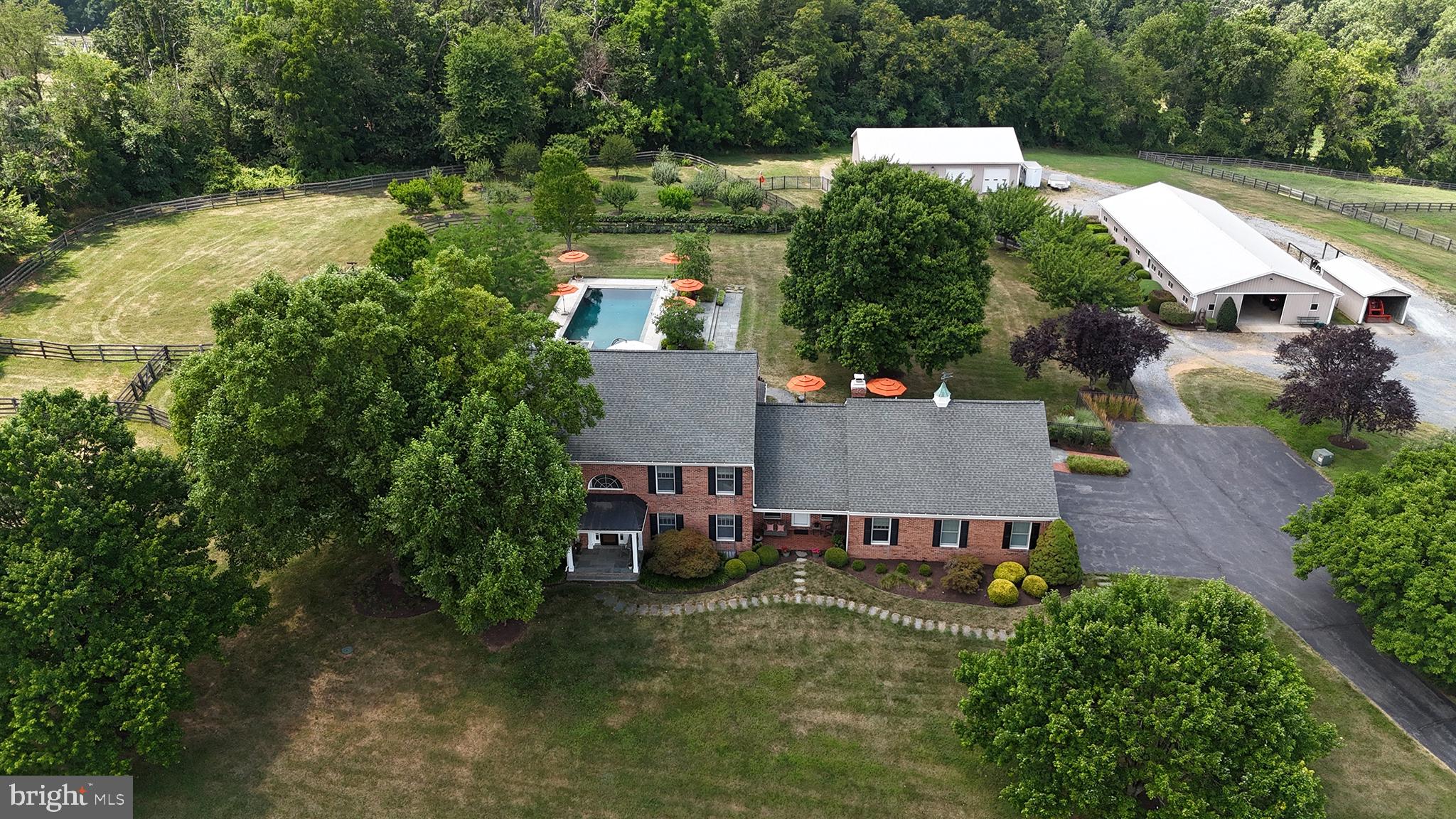 26100 Mullinix Mill Road Mount Airy, MD 21771 - Photo 4 of 99 Serene estate with lush greenery.