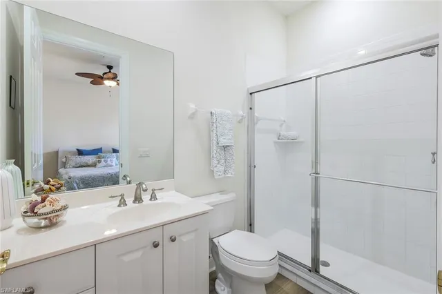 an aerial view of a house with yard and mountain view in back