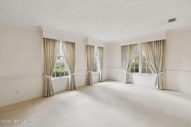 a kitchen with stainless steel appliances granite countertop a sink and a stove