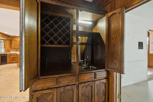 a view of an empty room with a fireplace