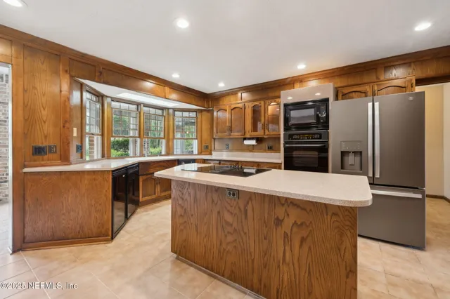 a bathroom with a sink a double vanity and a mirror