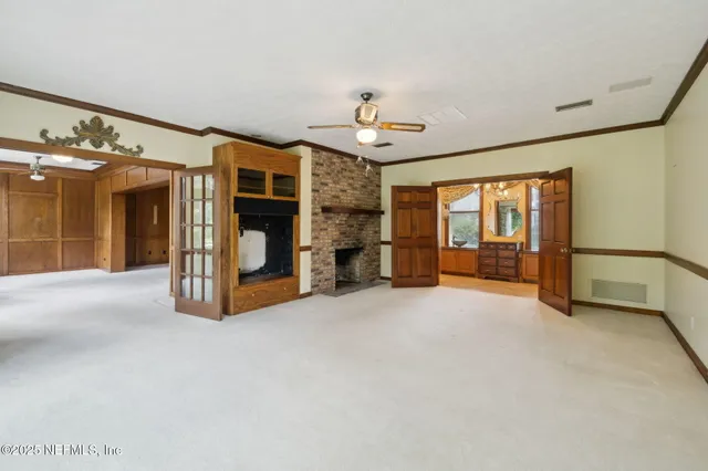 a bathroom with a granite countertop sink mirror and a bathtub