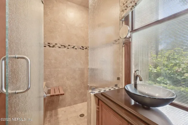 a swimming pool with outdoor seating yard and outdoor seating