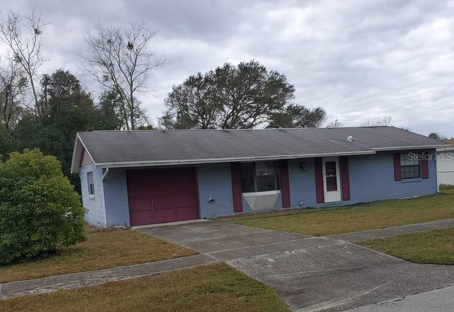 3410 Southwest 147 Lane Road Ocala, FL 34473 - Photo 1 of 1 a house view with a garden space