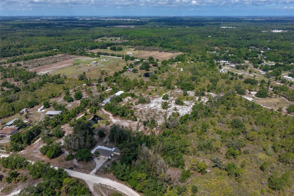 14451 Highland Road Wimauma, FL 33598 - Photo 75 of 80 an aerial view of residential house and green space