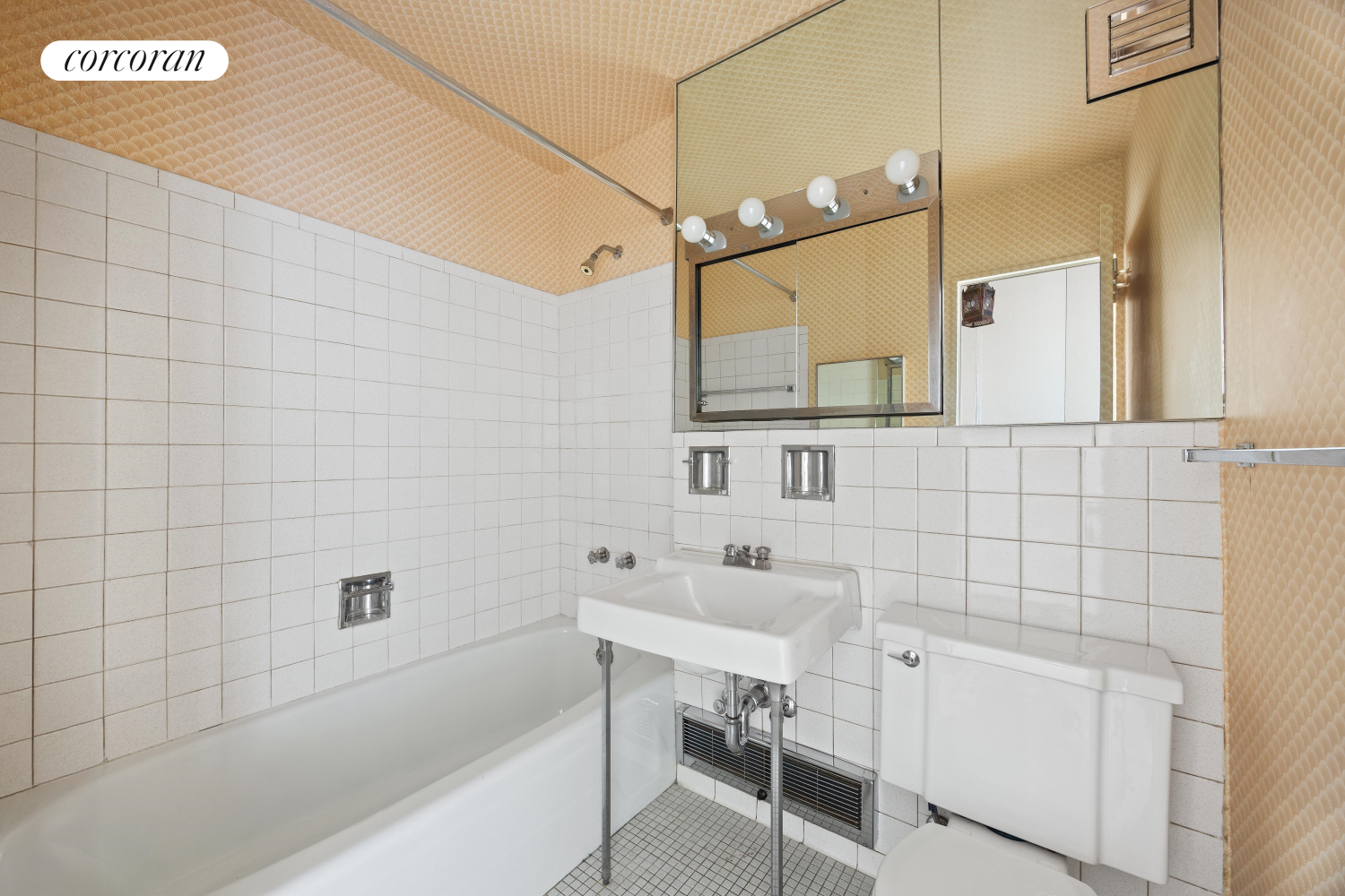 360 East 72nd Street, Unit C2003 Manhattan, NY 10021 - Photo 13 of 22 a bathroom with a sink a toilet and shower