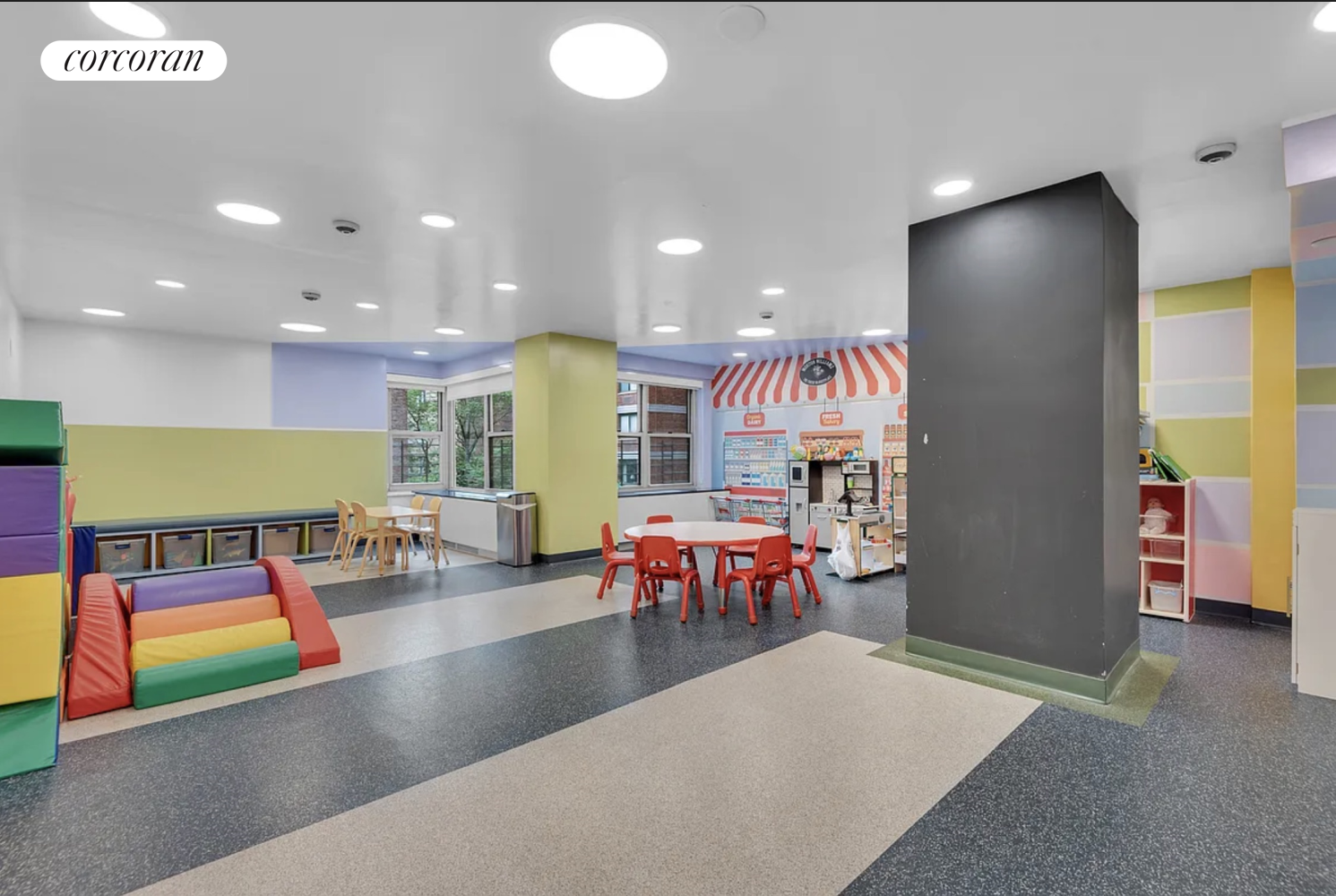 360 East 72nd Street, Unit C2003 Manhattan, NY 10021 - Photo 17 of 22 a living room with furniture and a table