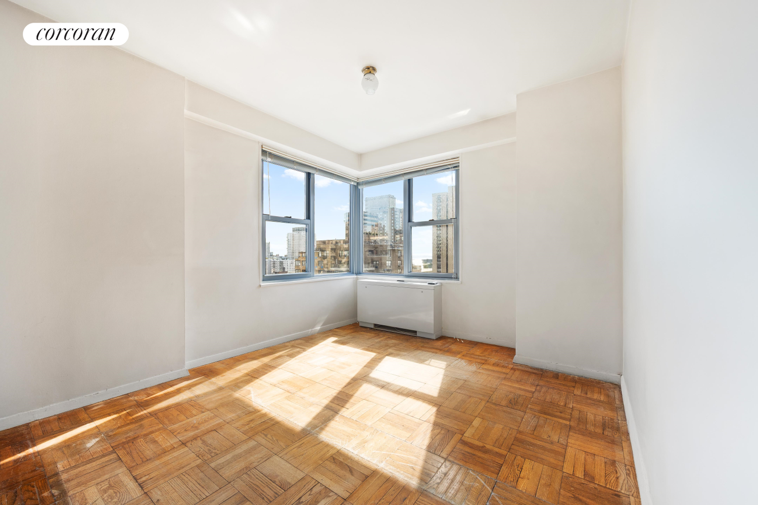 360 East 72nd Street, Unit C2003 Manhattan, NY 10021 - Photo 8 of 22 a view of an empty room and window