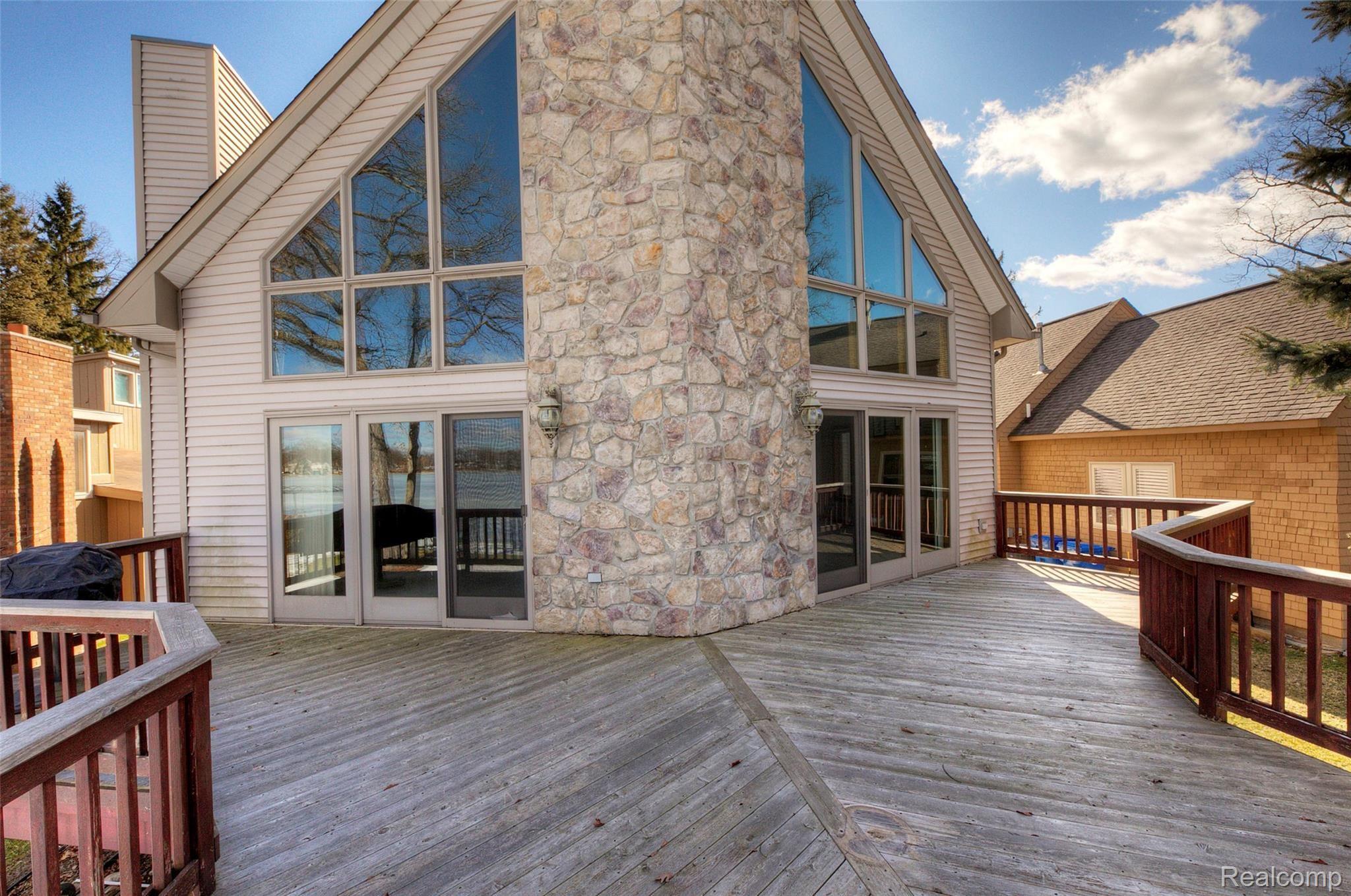 7154 Hatchery Road Waterford, MI 48327 - Photo 63 of 80 LAKESIDE WITH WALL TO CEILING WINDOWS